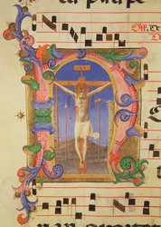 La Crucifixión en una inicial historiada 